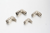 Fitsch push to connect grease fittings elbow male 90-degree plated brass connector designed for automated lubrication systems.