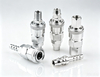 Heavy-duty rubber and aluminum dust caps attached to stainless steel hydraulic quick release plugs.