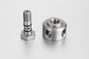 High pressure zinc-nickel plated steel lubrication banjo fitting and matching fluid pass-through bolt designed for centralized grease lines.