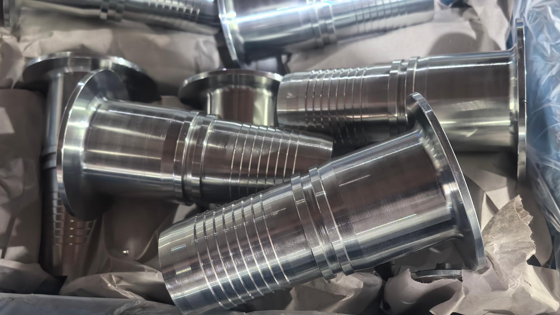 Plated carbon steel and 316 stainless steel king turned back hose nipple with barbed shank for loose lap joint floating flange assemblies.