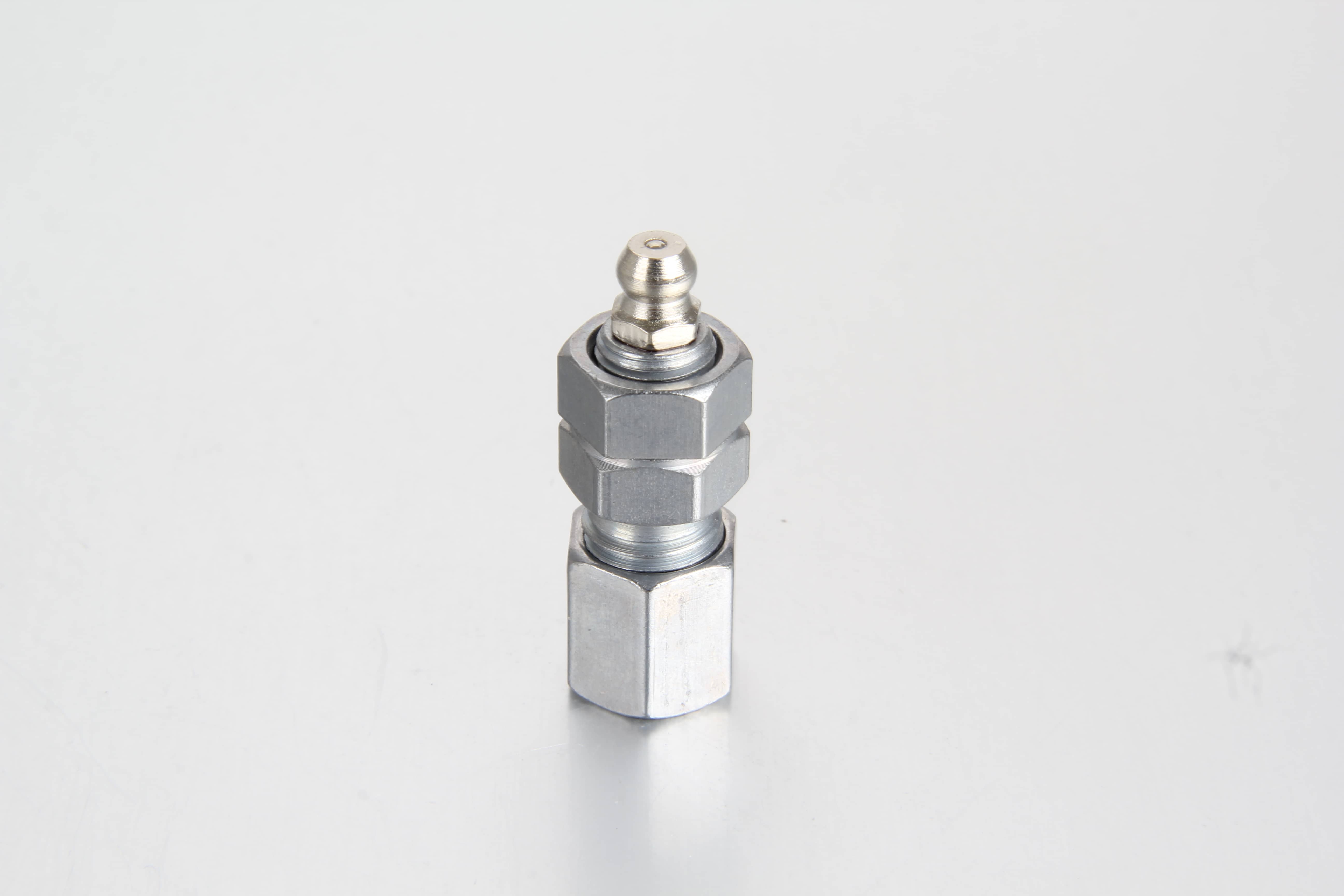Metric straight bulkhead female coupling assembly with an integrated grease nipple on the outer panel port for BEKA-MAX automatic lubrication systems.
