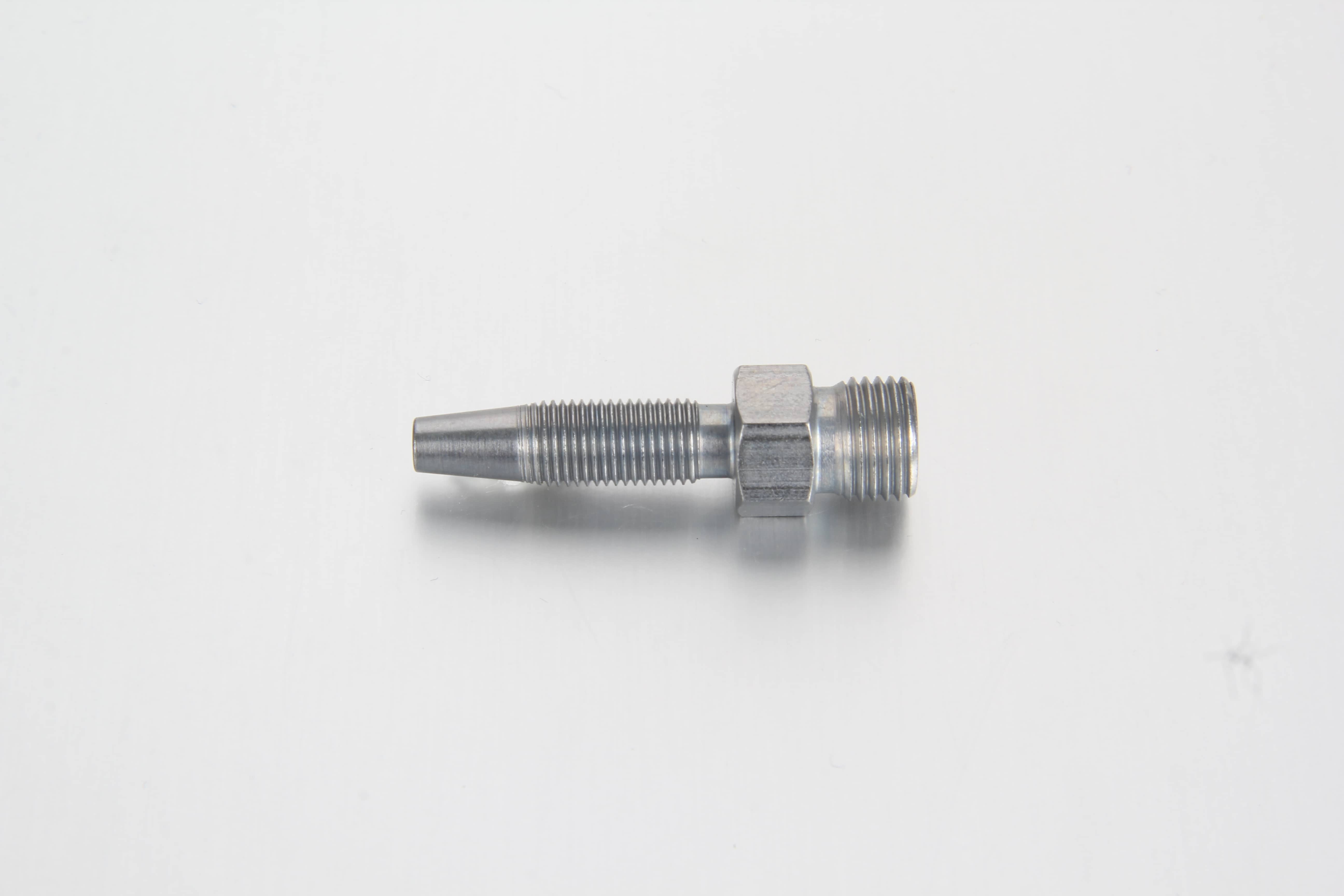 A DIN 2353 tube end standpipe hose stud inserted into a standard compression coupling body with a cutting ring biting onto the steel stem.