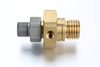Side profile of a specialized OEM lubrication quick coupling socket showing the main grease inlet and the secondary return flow line port.