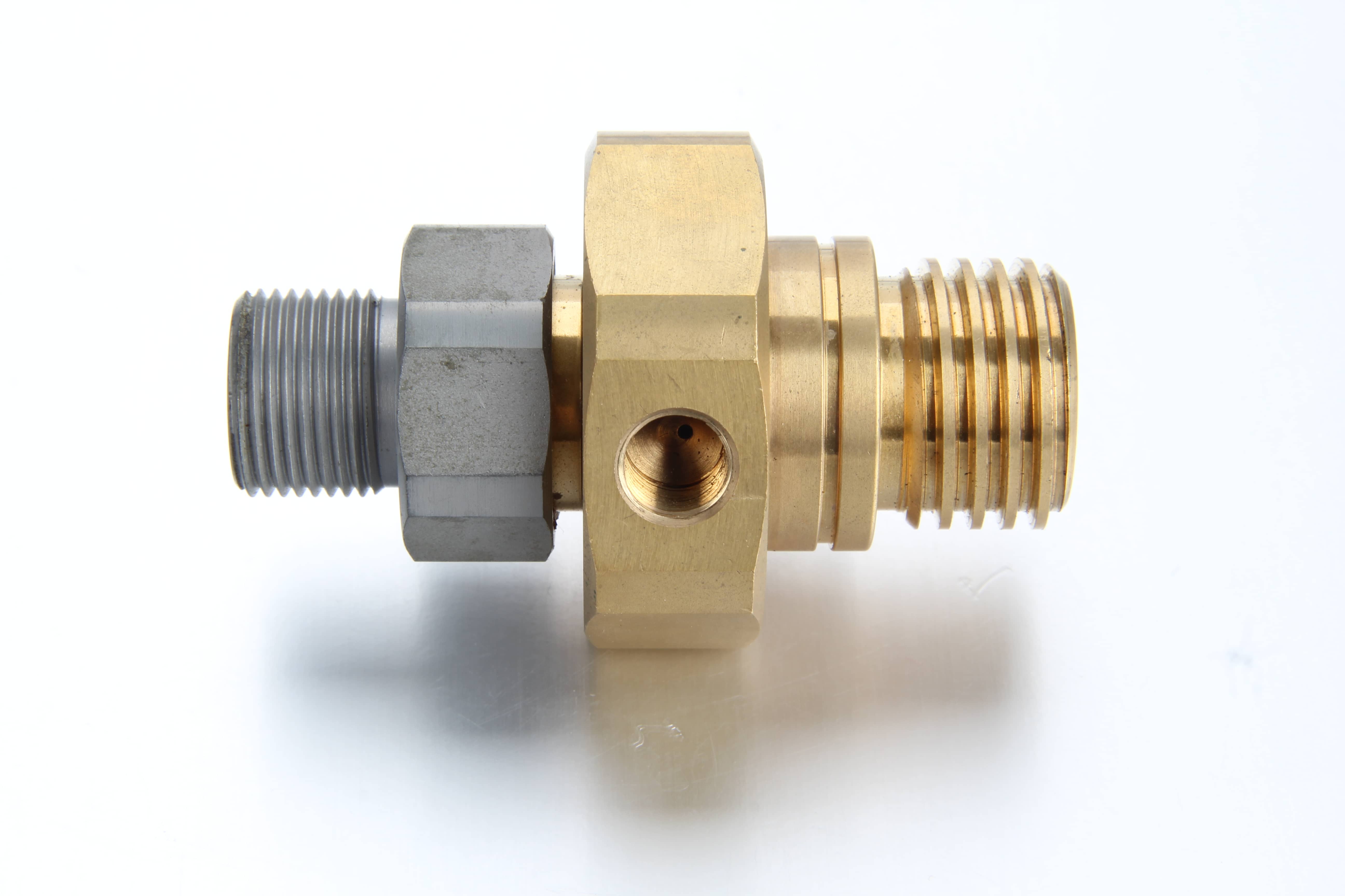 Side profile of a specialized OEM lubrication quick coupling socket showing the main grease inlet and the secondary return flow line port.