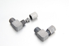 Side-by-side comparison of BSPT and NPT taper threads machined on 90 degree cutting ring elbows.