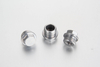 A professional white-background studio shot of a steel DIN 910 external hexagon head screw plug highlighting its precision-machined heavy-duty sealing collar face.