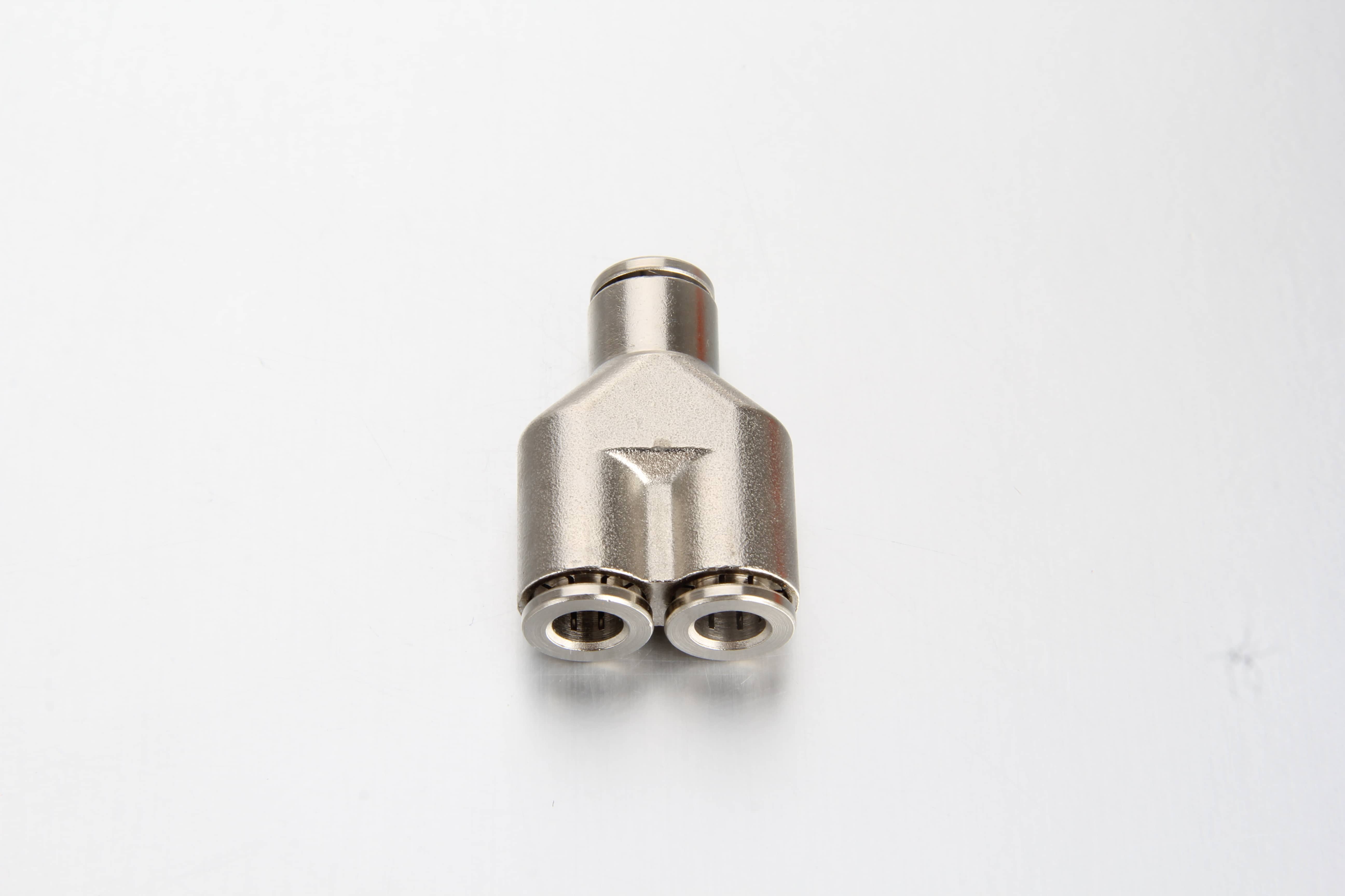 Studio shot of a heavy-duty 3-way quick-connect Y union fitting made of nickel-plated brass for centralized lubrication systems