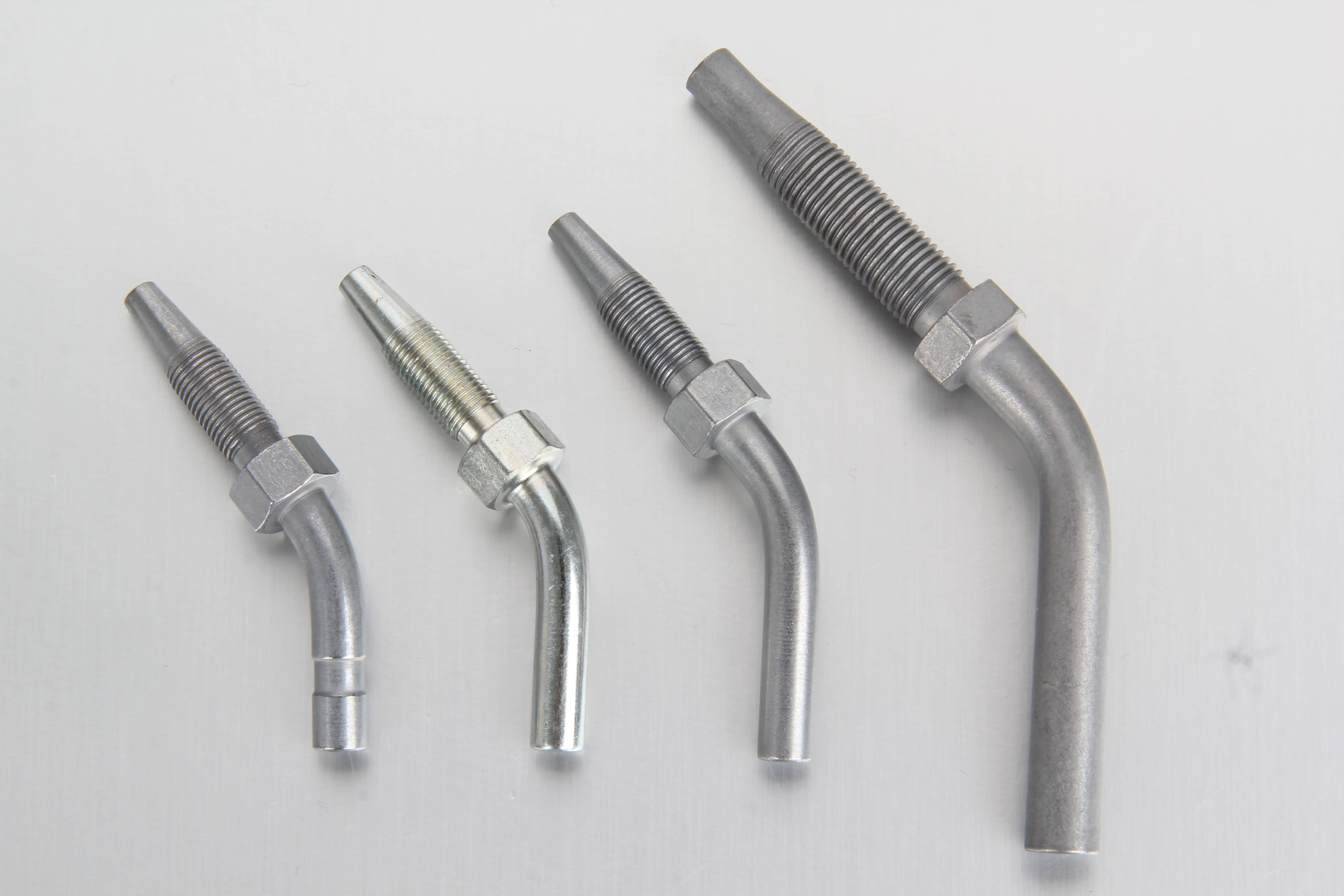 Premium metric 45 degree elbow hose studs designed for high-pressure line routing in an automatic lubrication system.