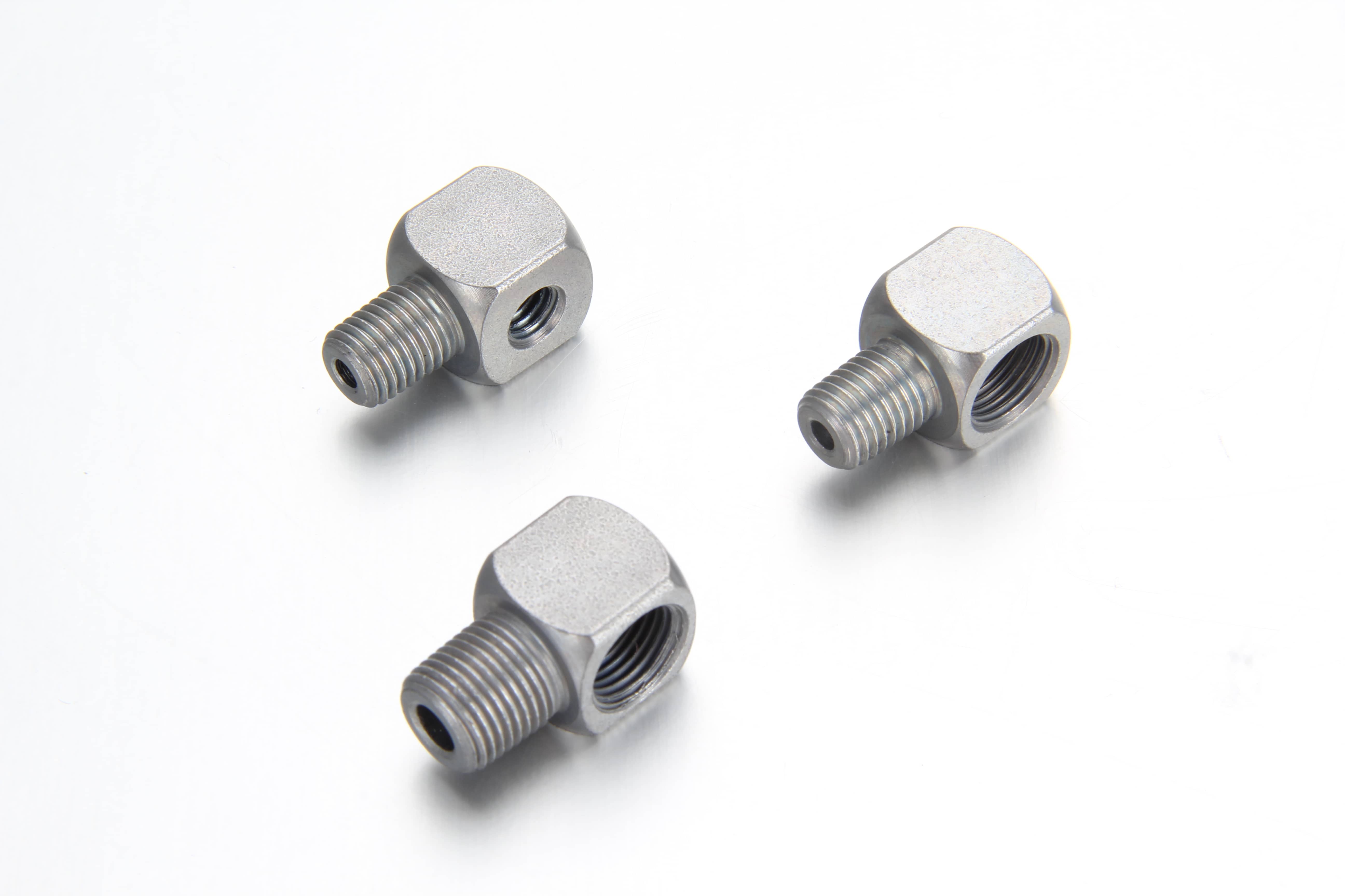 High pressure steel 90 degree lubrication elbow adapter showing male metric tapered threads and a female parallel thread port
