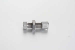 Metric compression straight bulkhead female coupling assembly with an internal female thread on one end and a compression tube connector on the other.