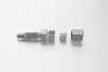 Premium metric hose stud to DIN 2353 tube end standpipe assembly for high-pressure lines in an auto lube system