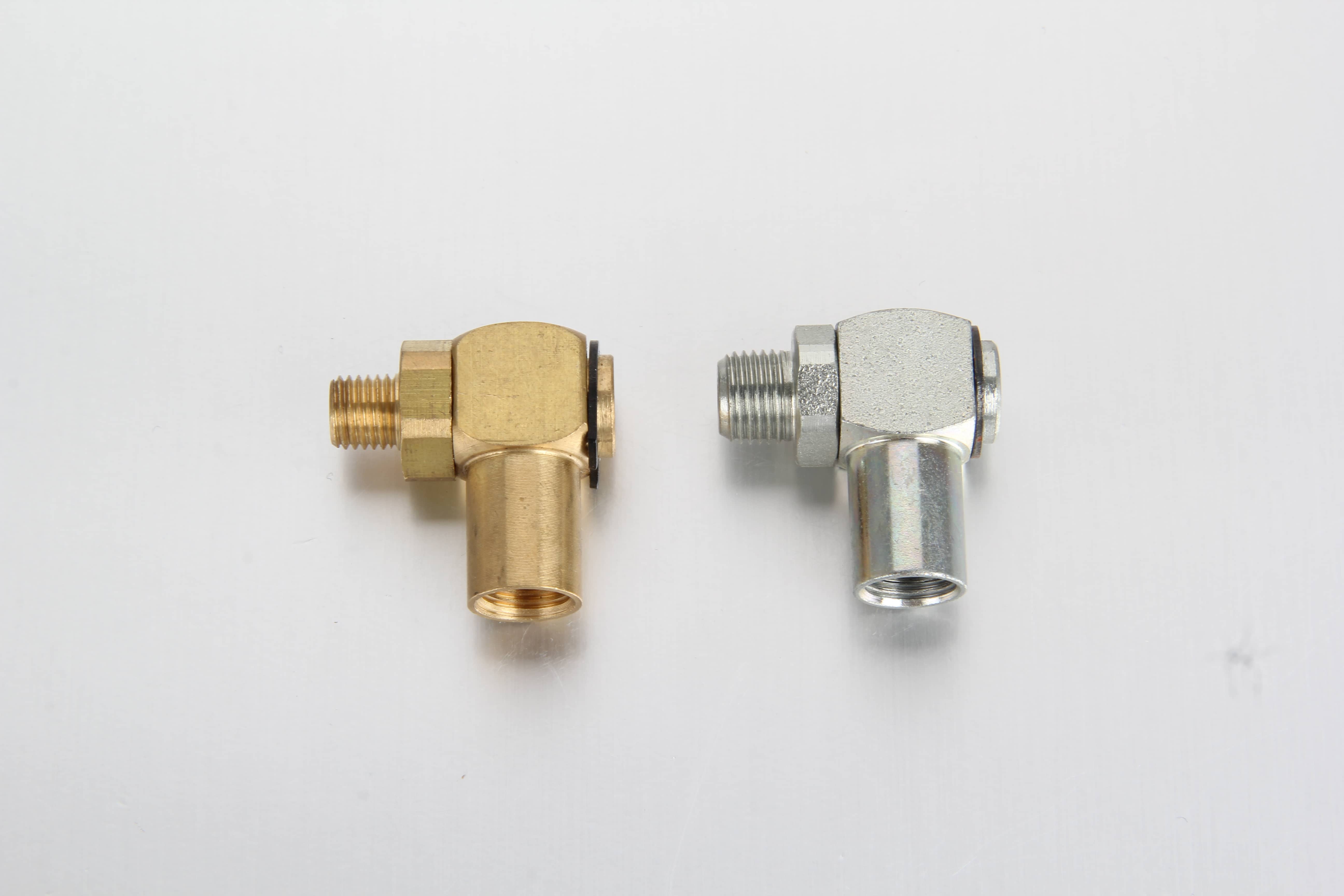 A professional close-up shot of a 90-degree freely movable swivel banjo fitting with an integrated high-pressure rotating joint for central lubrication grease lines.