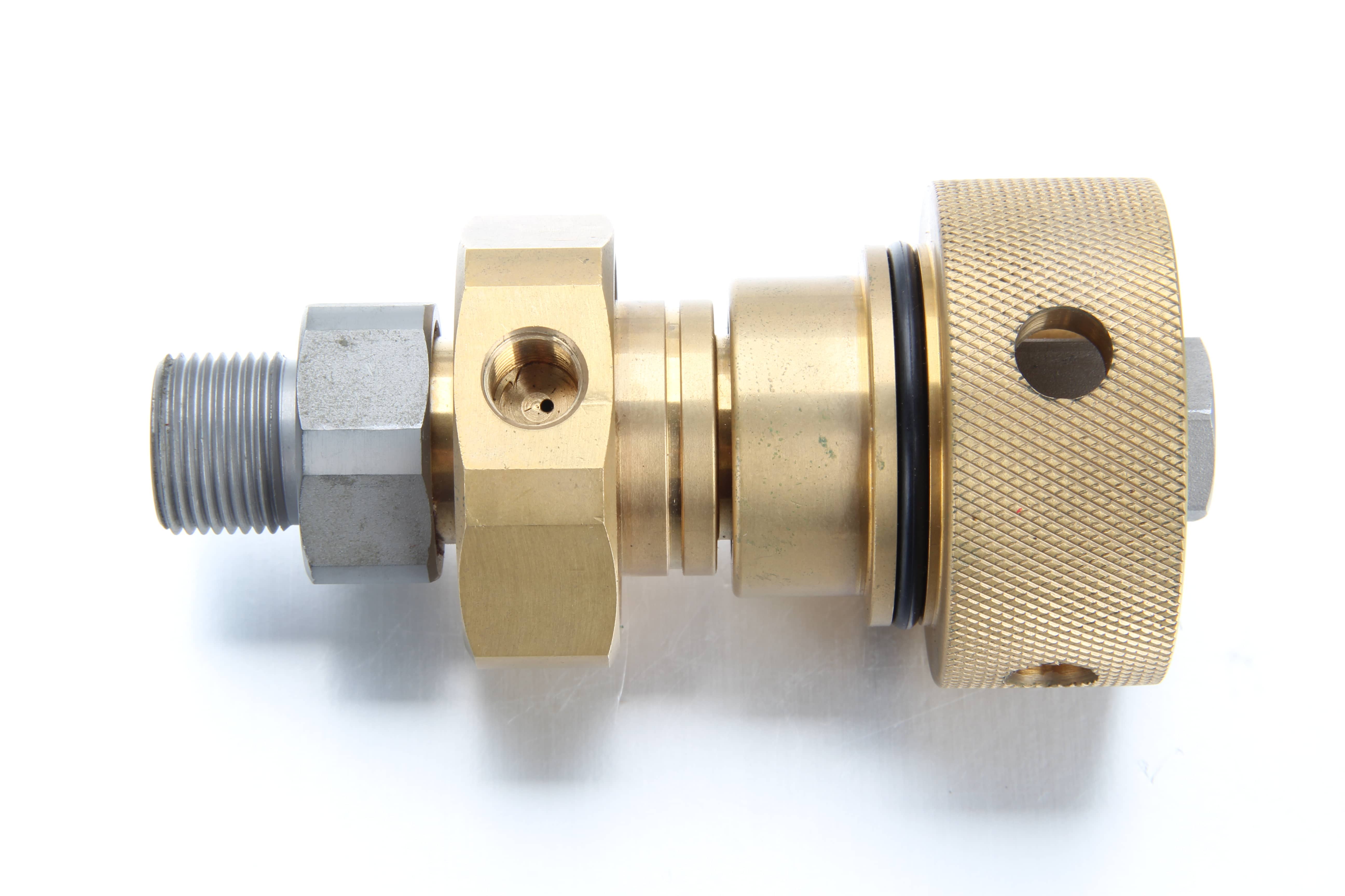 A matched OEM lubrication quick disconnect set with a pressure-relief female socket and heavy-duty male plug.