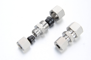 Complete assembly of 316L stainless steel DIN 2353 cutting ring fittings with union nut and 24 degree cone body.