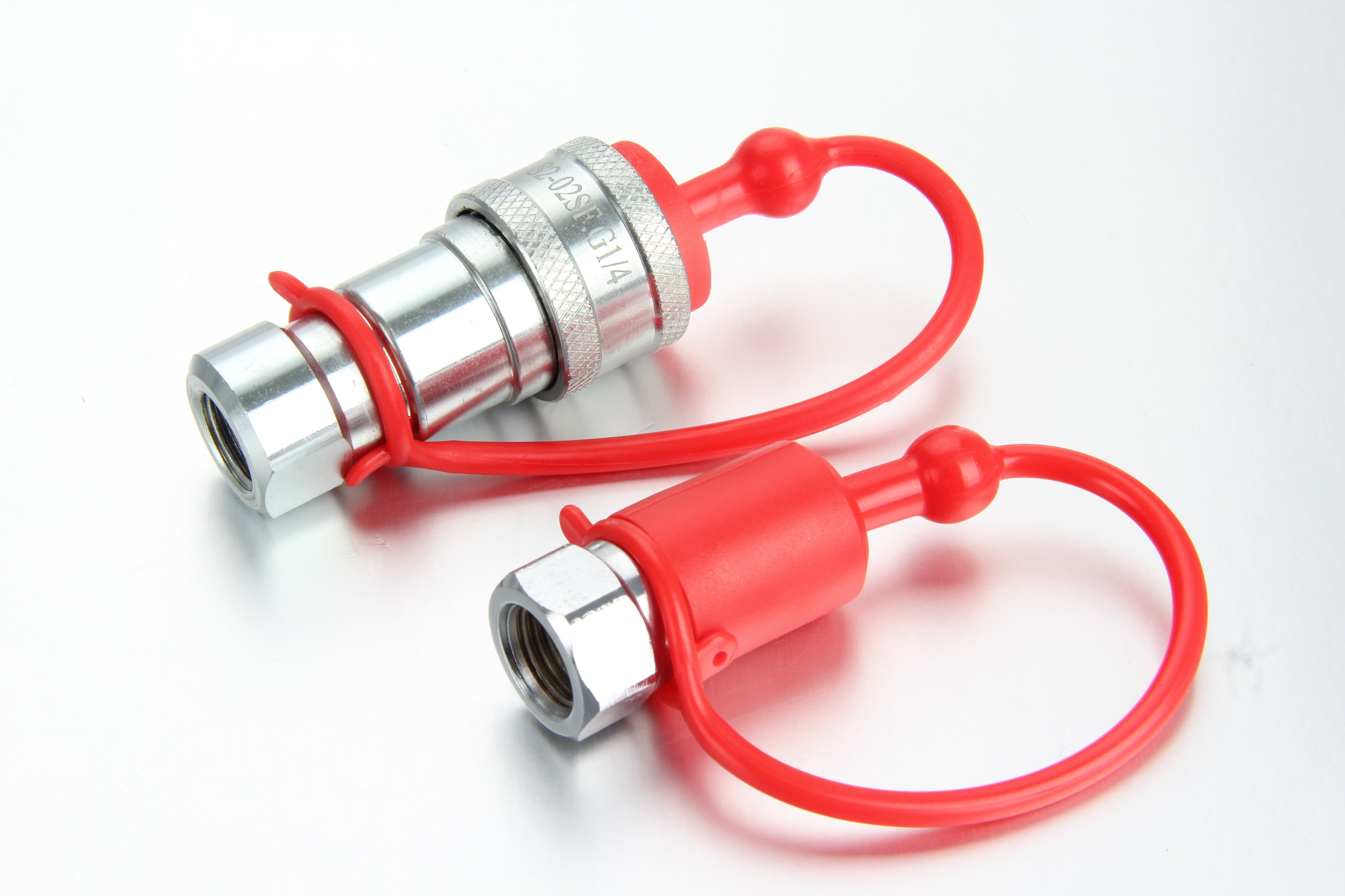 Side-by-side material comparison of ISO 7241-B hydraulic couplings in carbon steel, 316 stainless steel, and brass configurations.