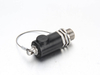 Durable rubber protective cap attached to a railway test point fitting to protect against dust and ballast.