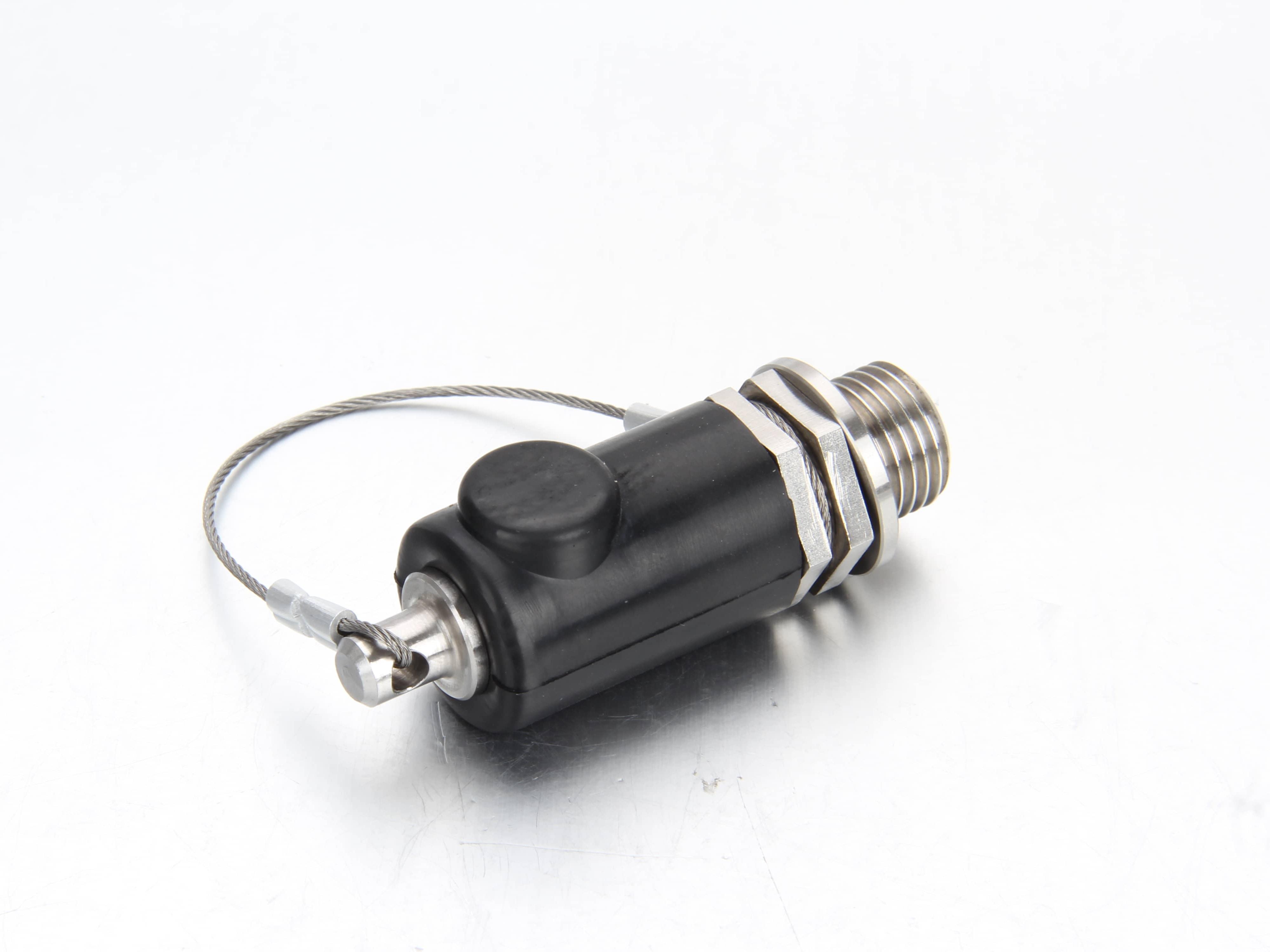 Durable rubber protective cap attached to a railway test point fitting to protect against dust and ballast.