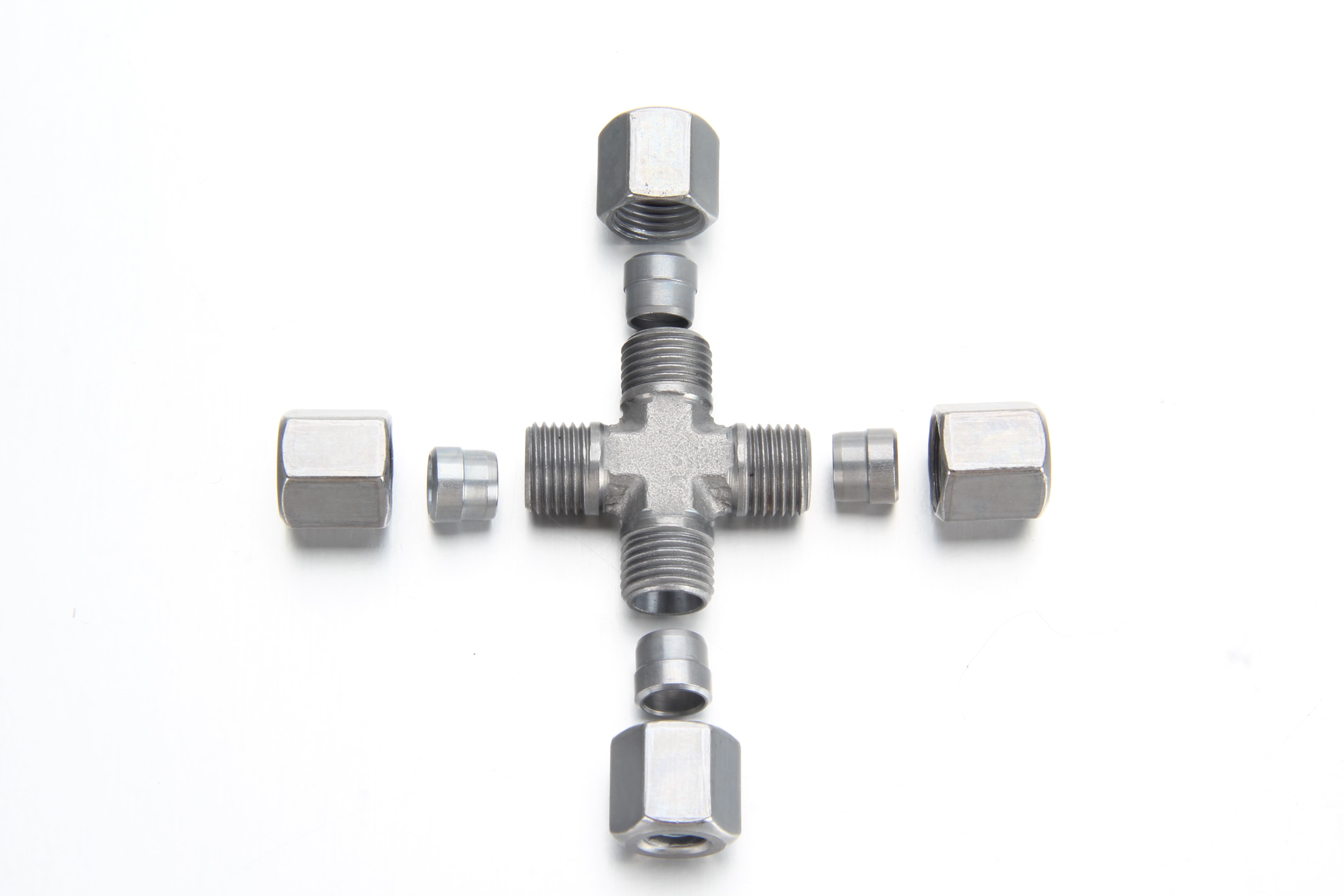 Metric compression union cross fitting assembly joining four identical 4mm or 6mm grease lines.